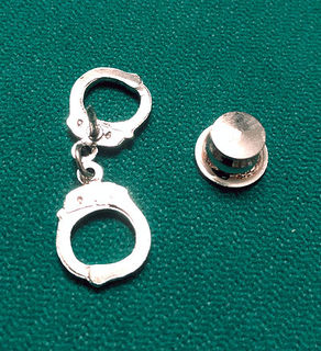 micucci-handcuffs-400b.jpg